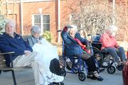 Delighted residents watch the Friends &amp; Family Parade