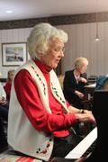 Barbara plays Christmas favorites for everyone to sing